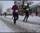 Despite a winter snowstorm, paczki runners stay on track
